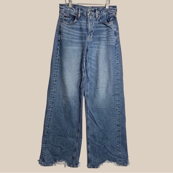 American Eagle Outfitters Denim - American Eagle Outfitters Flare Jeans in Denim Blue with Frayed Bottoms Size 2